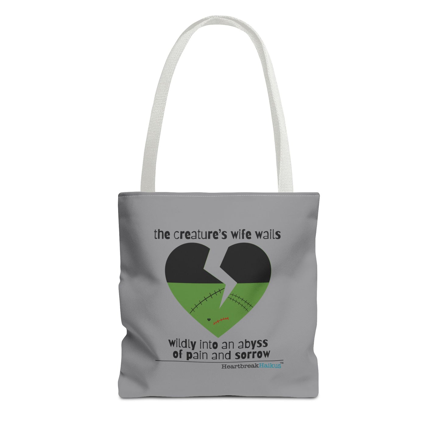 The Creature's Wife Wails Frankenstein Haiku tote bag in stone grey with a heart design and haunting text.