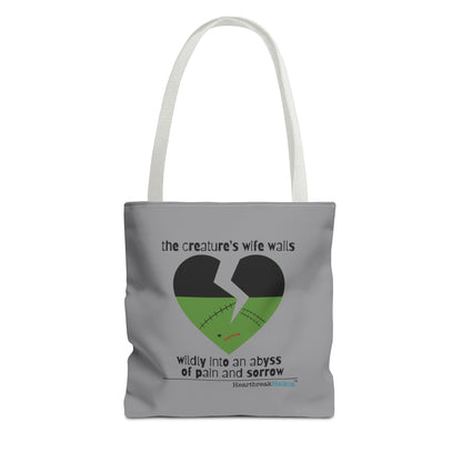 The Creature's Wife Wails Frankenstein Haiku tote bag in stone grey with a heart design and haunting text.