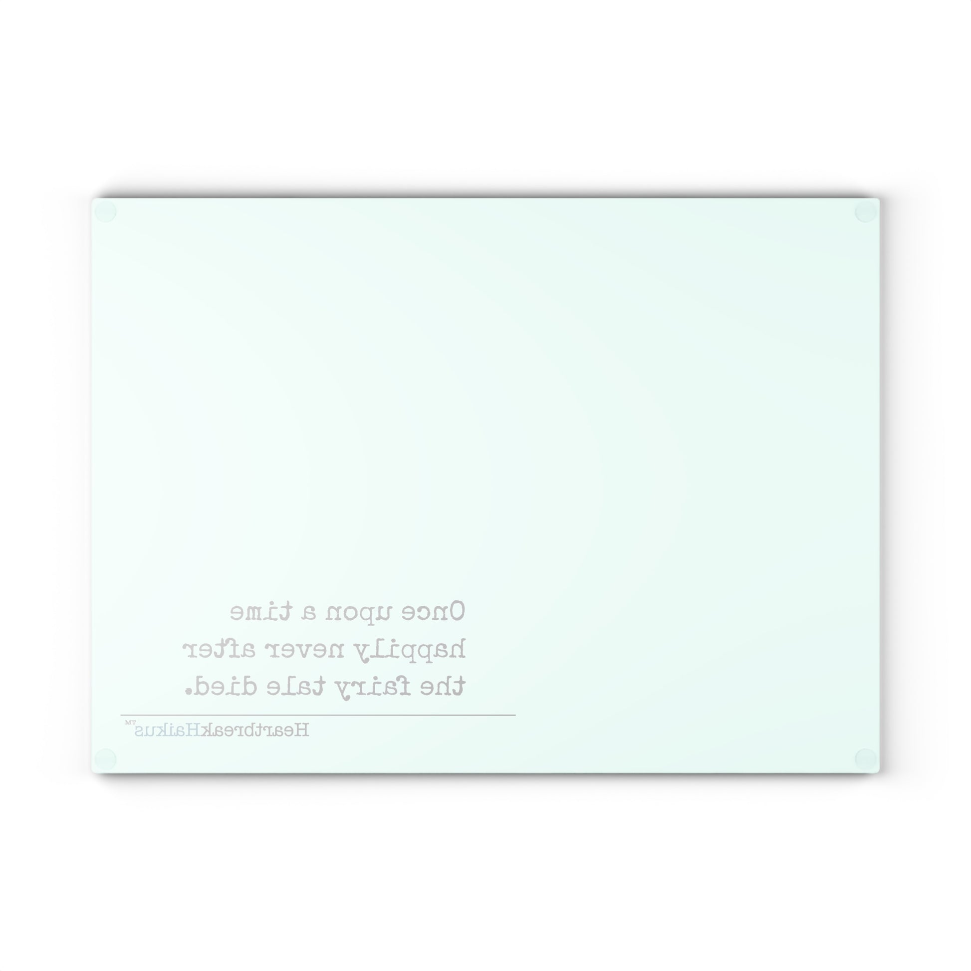 This cutting board features an original Heartbreak Haiku, perfect for adding a touch of creativity to your kitchen. The durable tempered glass material makes it a versatile preparation surface, while the vibrant colors and unique decoration process ensure