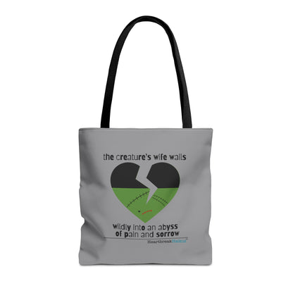 Frankenstein haiku tote bag featuring a heart design and the quote about pain and sorrow in stone grey.