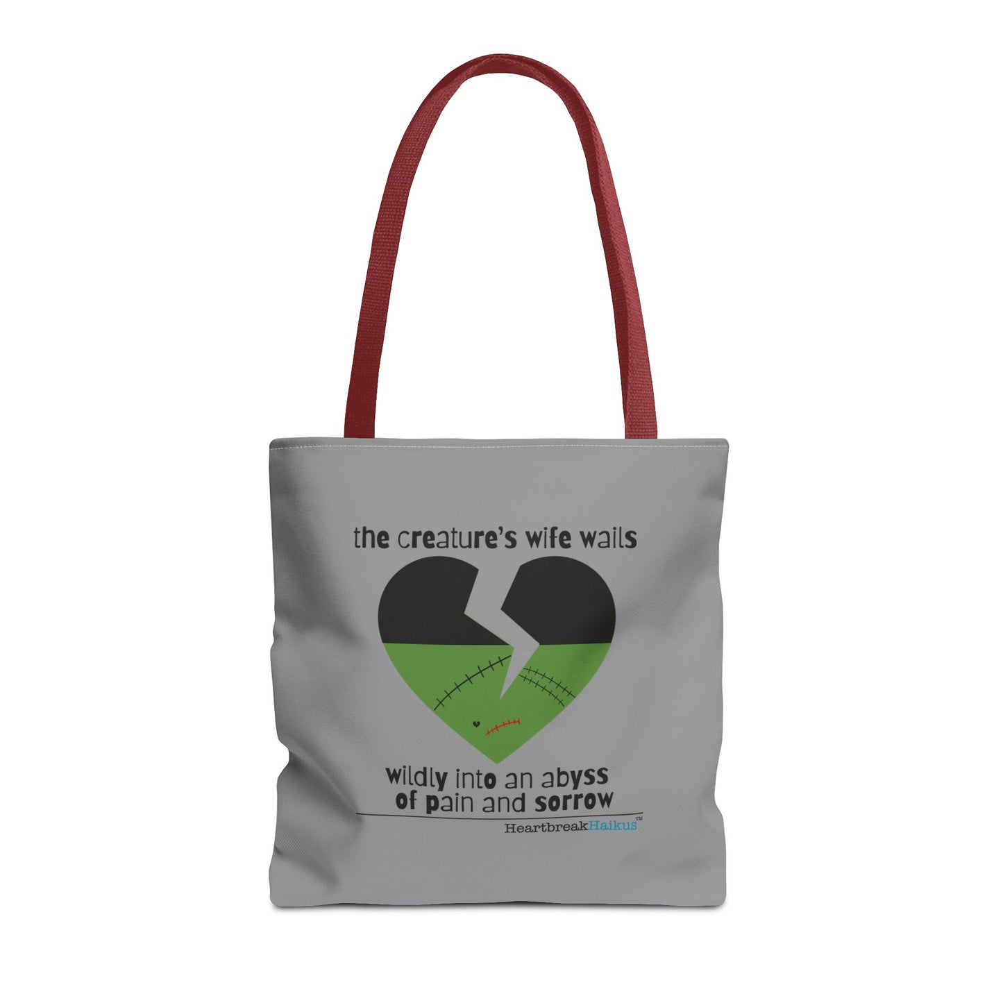 The Creature's Wife Wails Frankenstein Haiku tote bag in stone grey with artistic heart design.