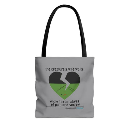 The Creature's Wife Wails Frankenstein Haiku tote bag in stone grey with heart design and poem text.